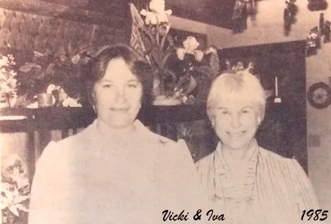 Founders Vicki McFall and her mother Iva Hughes among the flowers, 1985