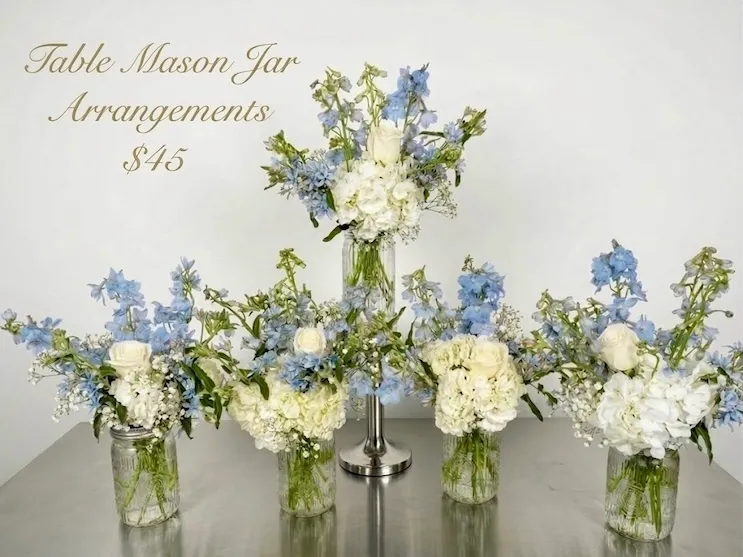 Table mason jar arrangements in whites and blues, $45